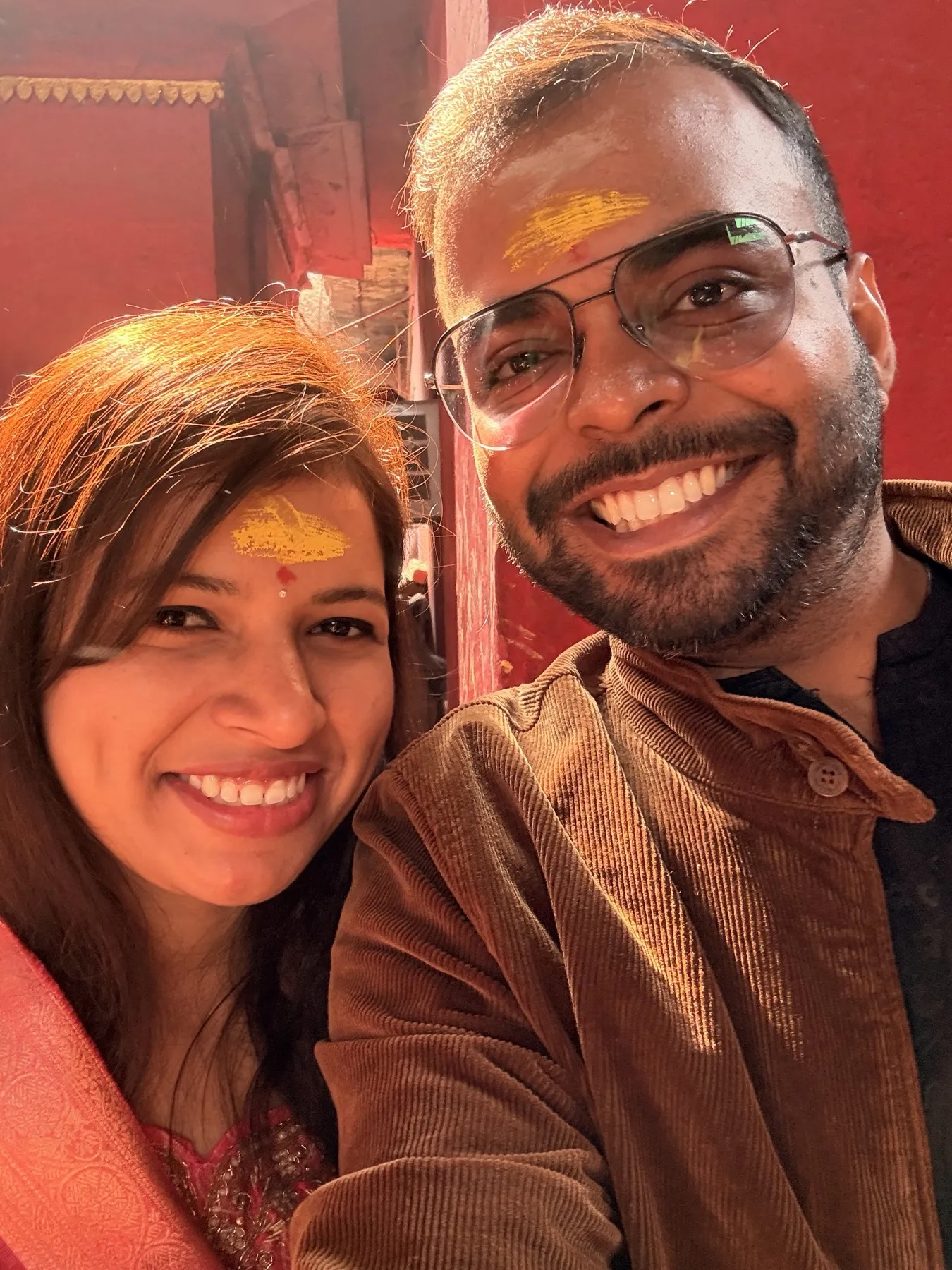 A close portrait of the two of us with tilak marks
